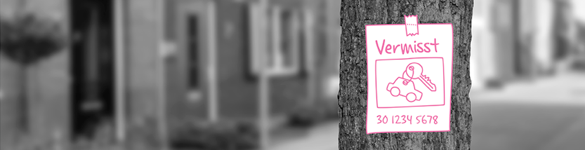 Zettel mit der Aufschrift ‚Schlüssel vermisst‘ ist an einem Baum befestigt