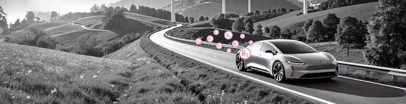 Ein modernes Wasserstoffauto fährt über eine Landstraße