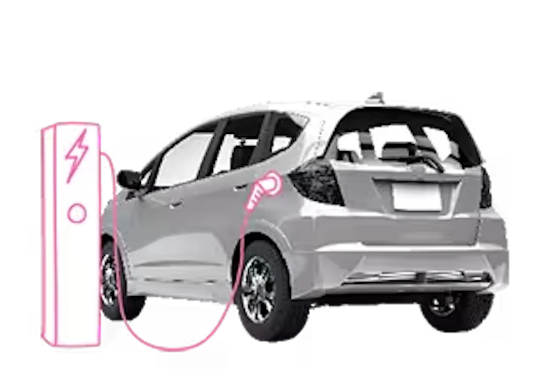 Ein E-Auto hängt an einer Ladesäule und wird geladen.