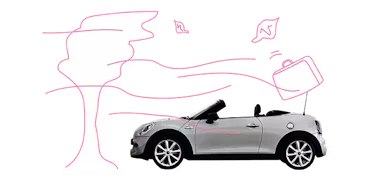 Auto fährt bei Sturm und es fliegen Dinge umher.