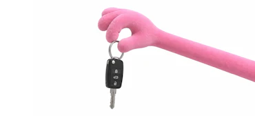 Puppet hält Schlüssel in der Hand